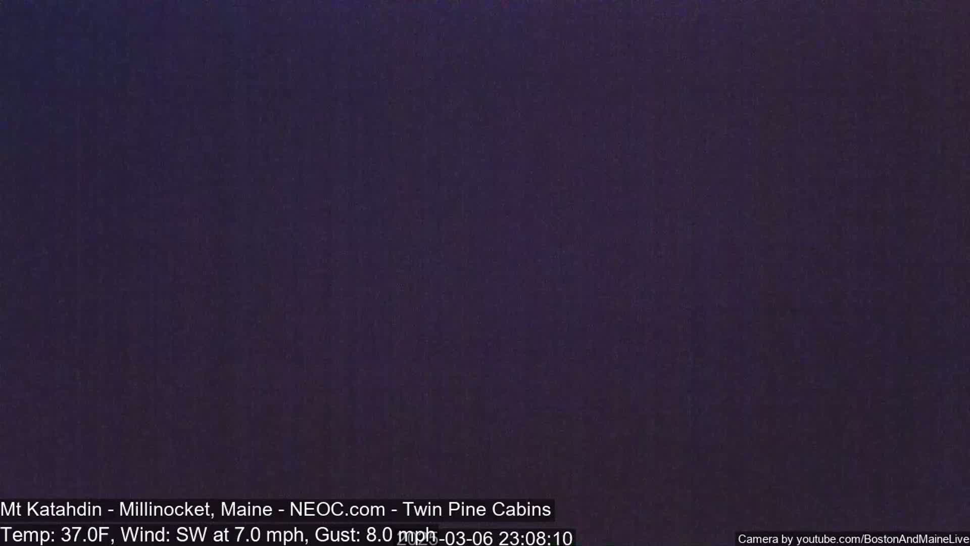 A dark purple image shows a nighttime outdoor scene with a temperature of 37°F and a southwest wind at 7 mph with gusts up to 8 mph.