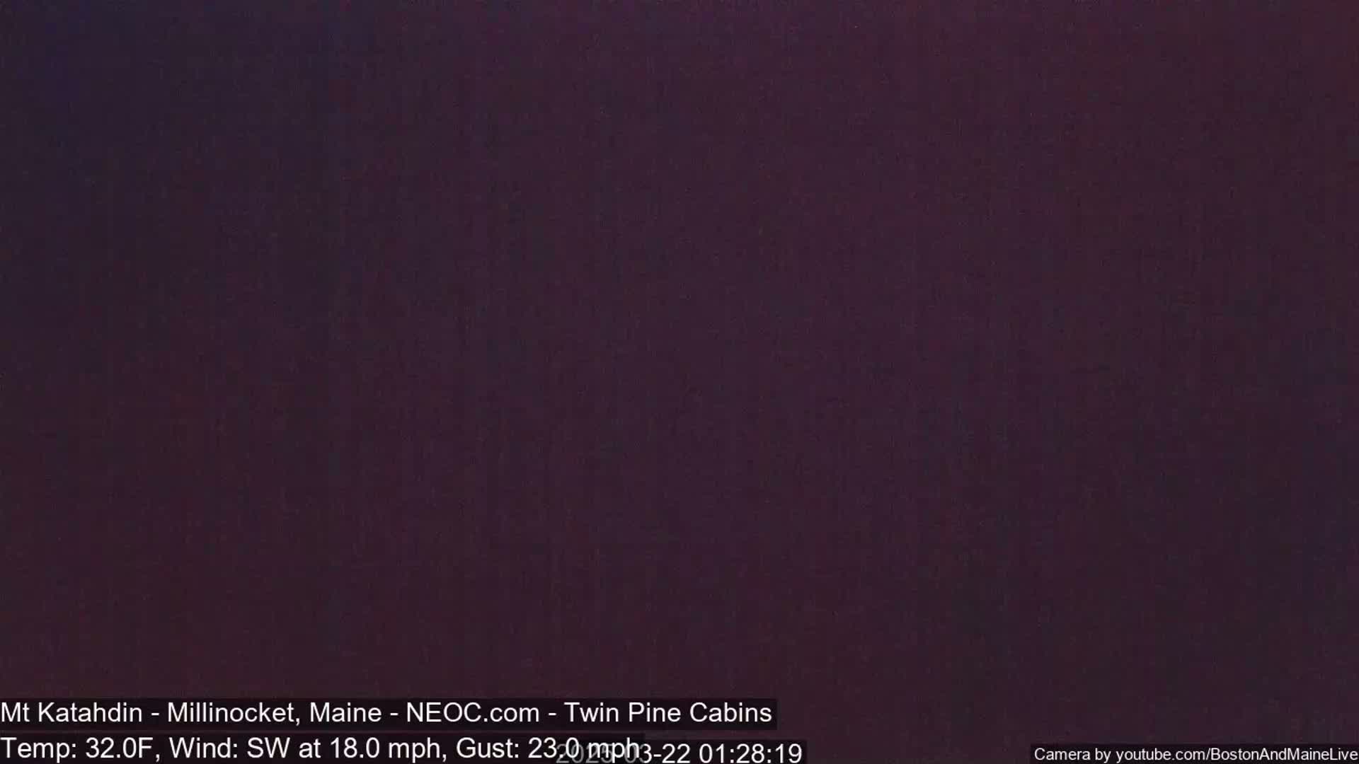A dark purple image shows an overcast night with a temperature of 32 degrees Fahrenheit and a southwest wind of 18 mph gusting to 23 mph.