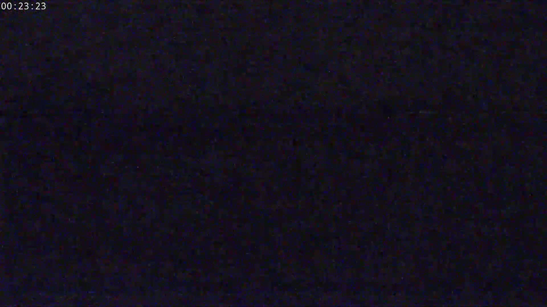 The image shows a dark, uniformly colored screen with a slightly grainy texture.