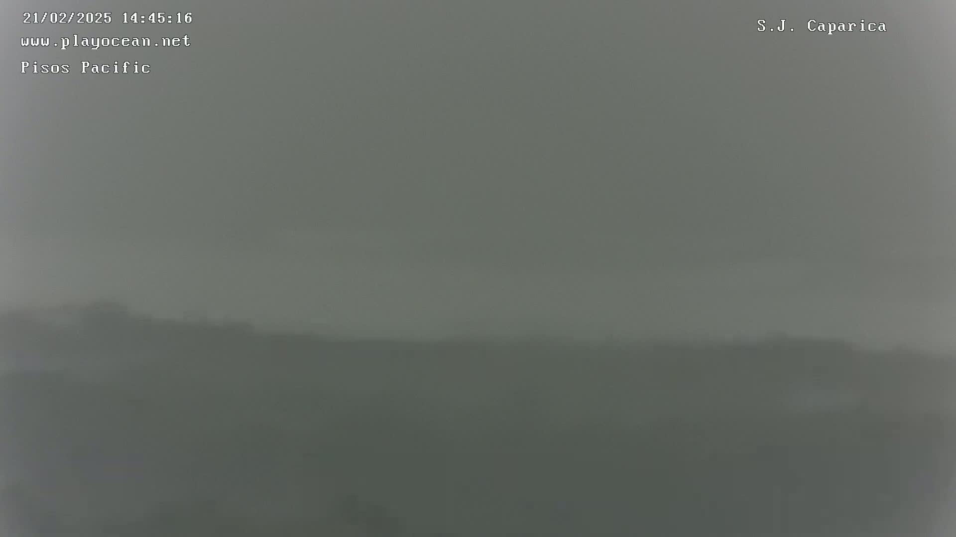 A hazy, overcast view of a flat landscape.
