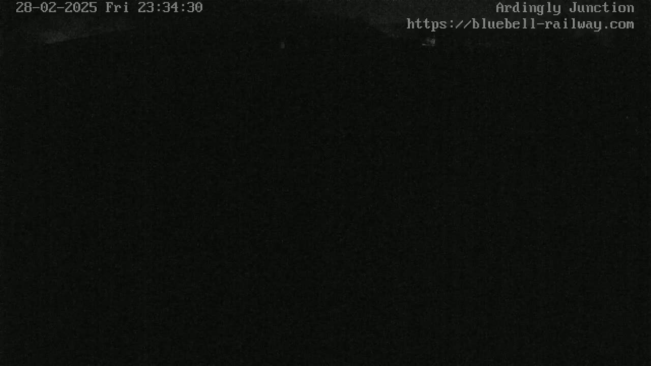 The image shows a completely dark, nighttime scene.