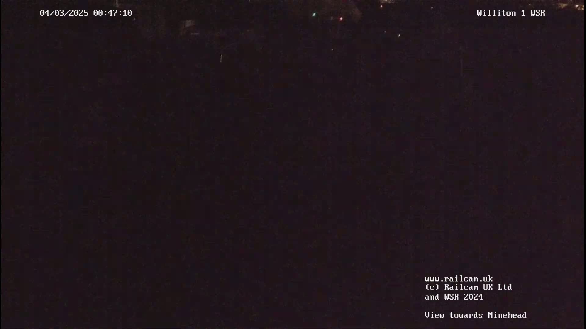 A nighttime, dark view of a landscape.