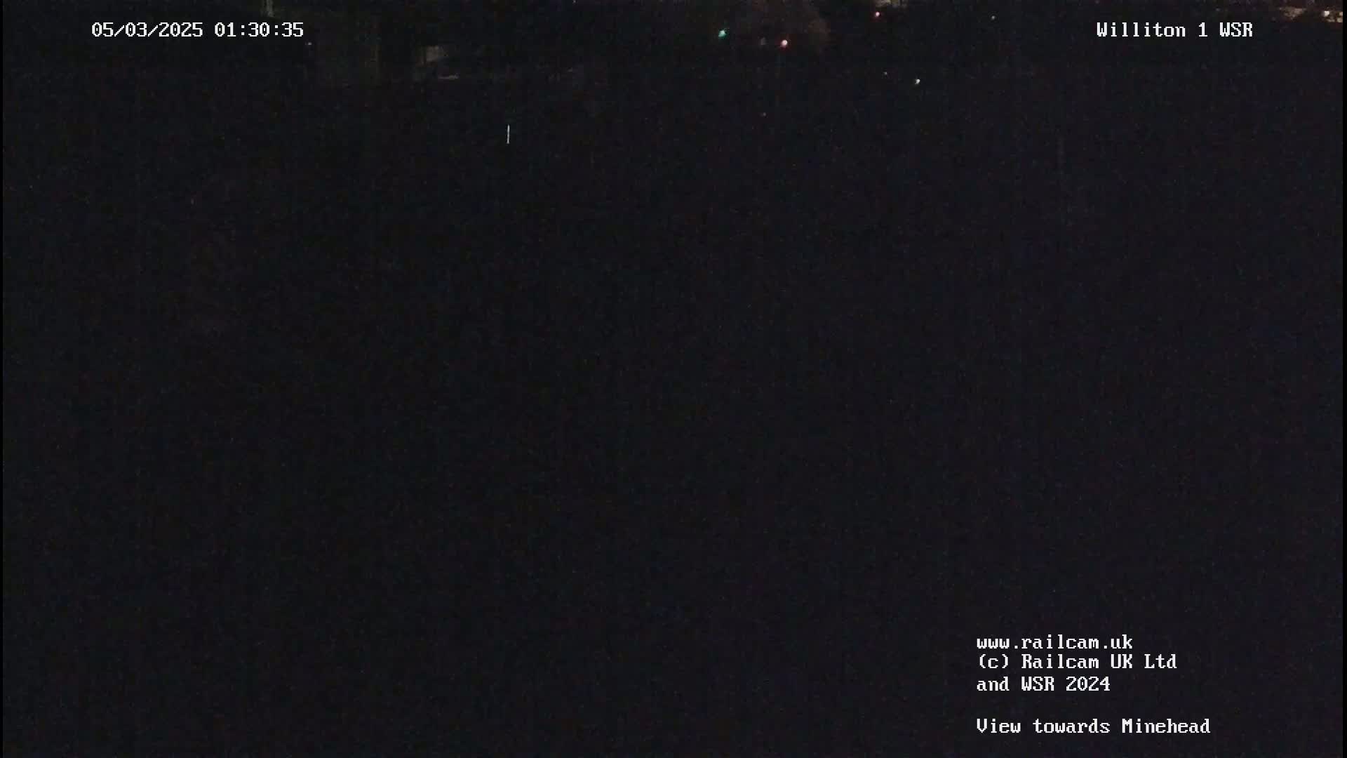 A nighttime, dark view of a landscape.