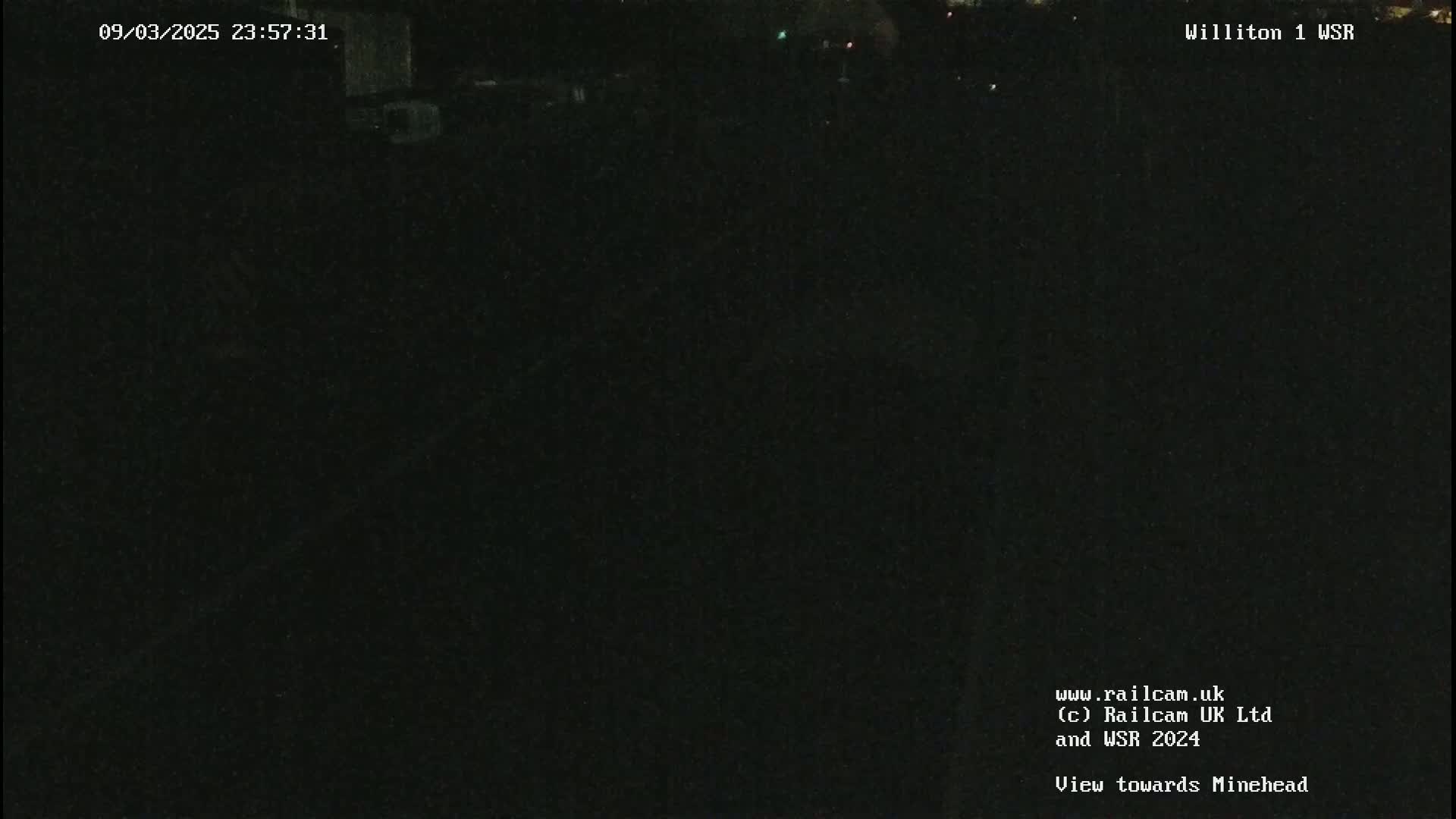A completely dark nighttime outdoor scene.