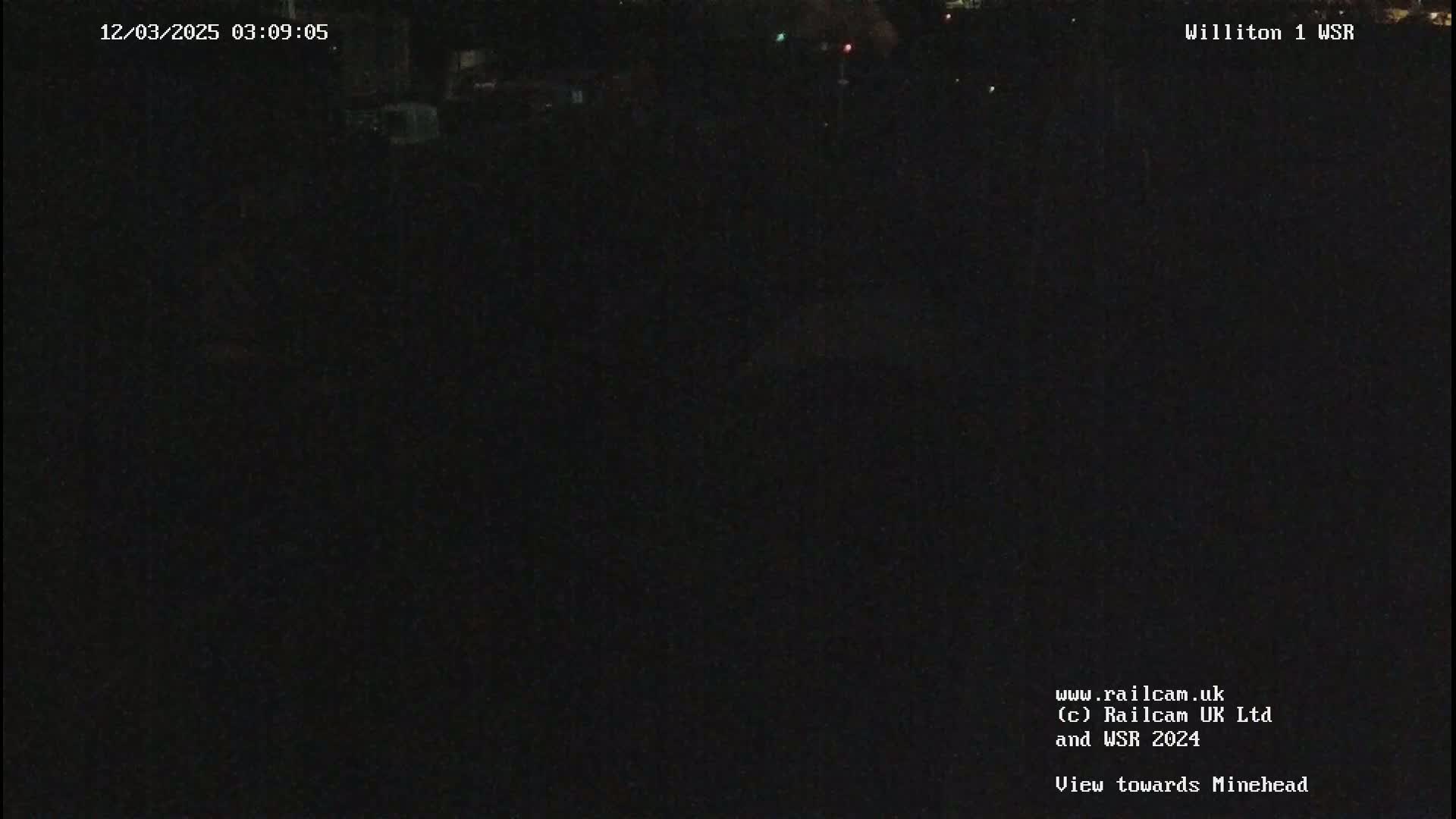 A dark, nighttime view of an empty area.