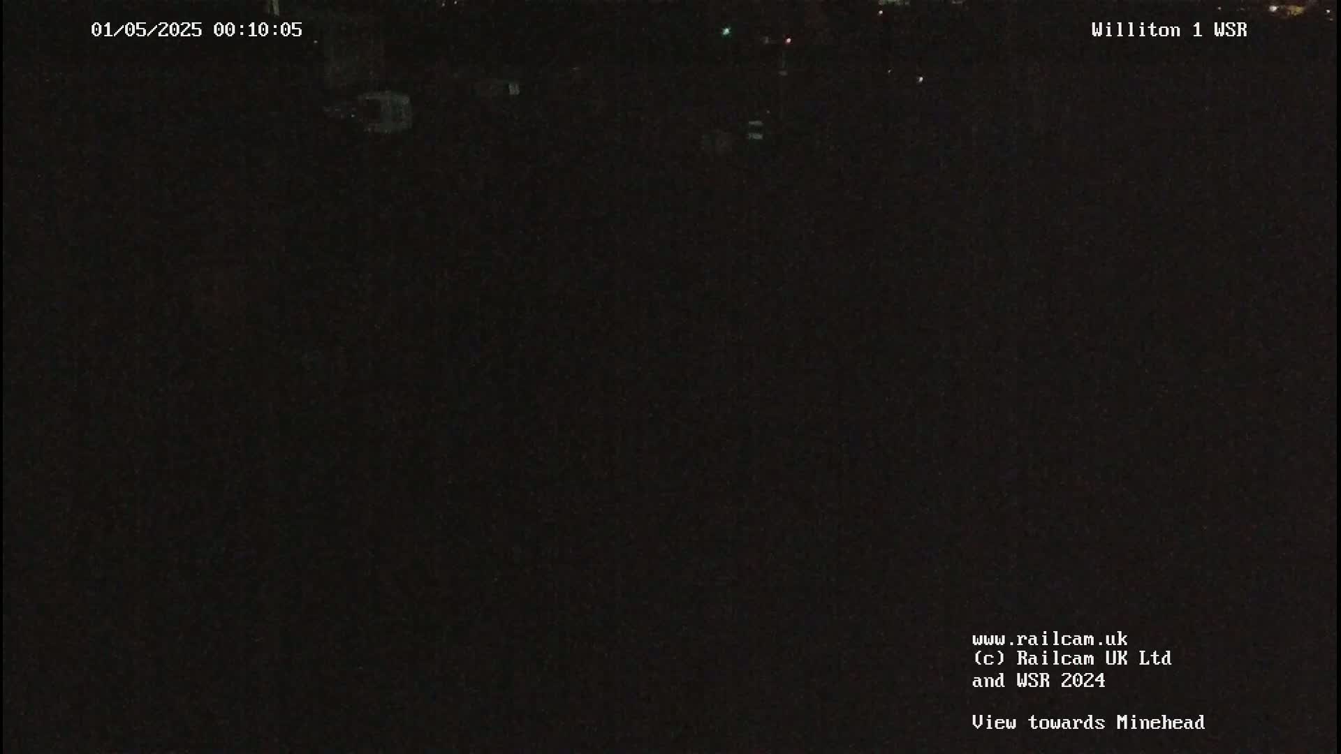 A nighttime, dark view of a field.