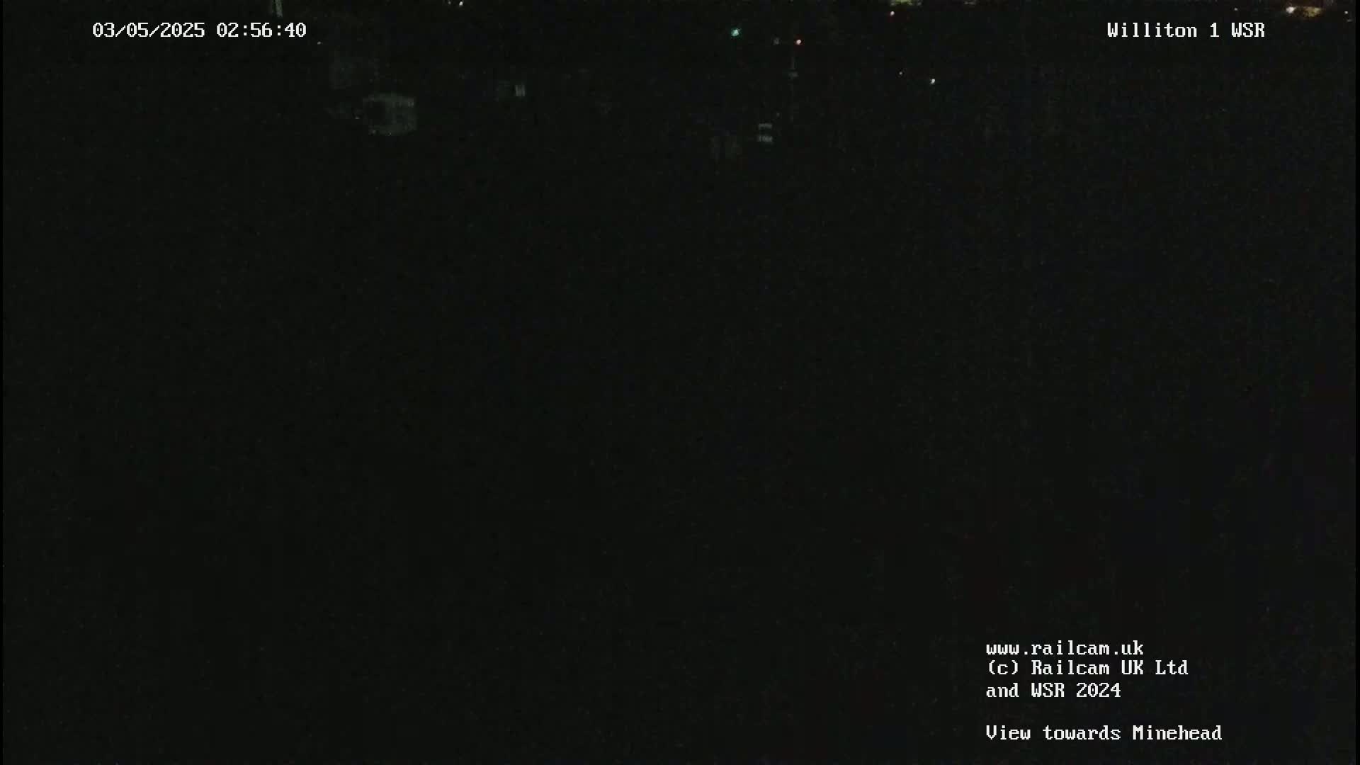 A nighttime, dark view of a landscape.
