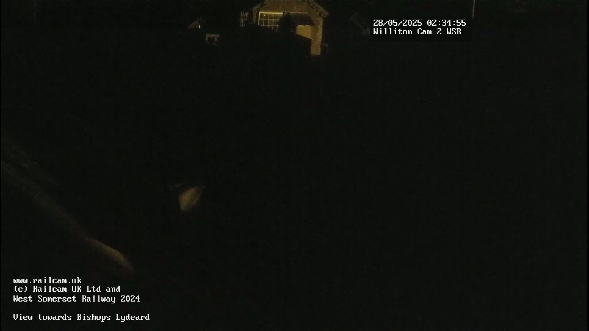 A dark, nighttime view of a building.