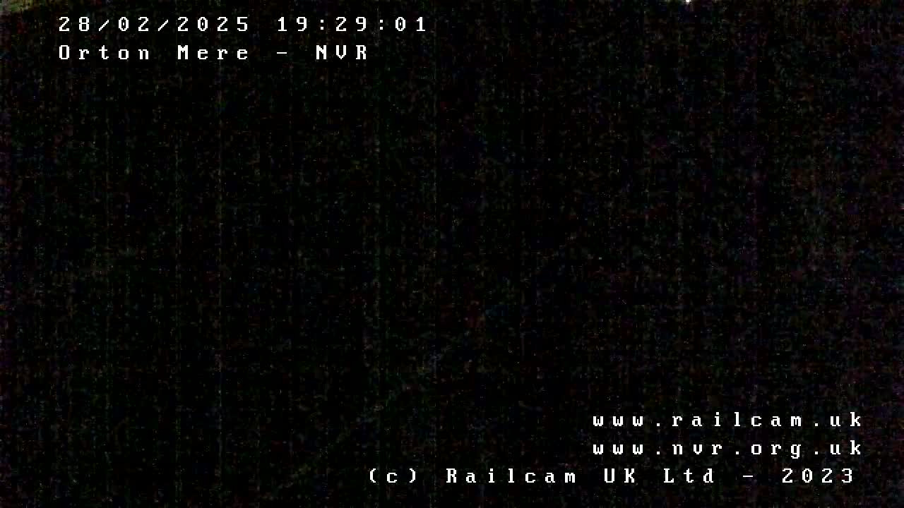 The image is a completely black nighttime shot.