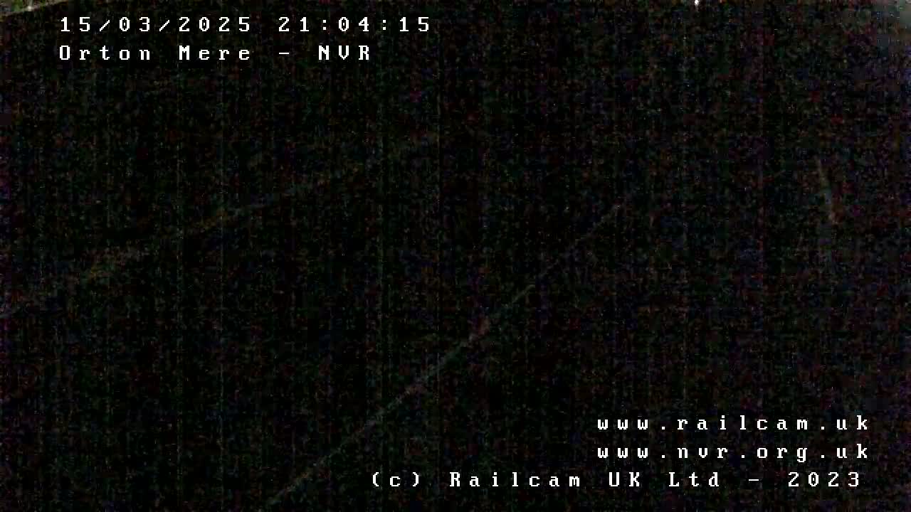 A completely dark image is shown, likely taken at night outdoors.