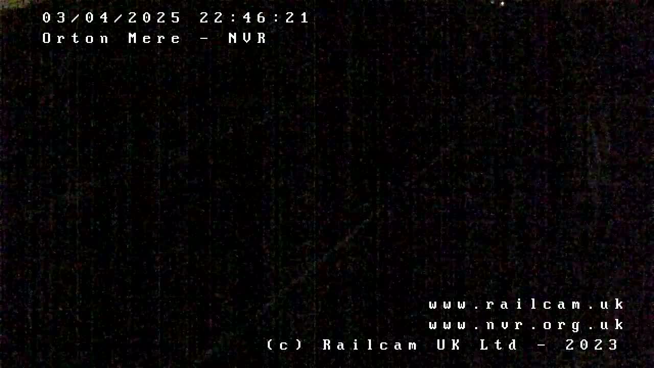 A nighttime image shows a completely dark scene.