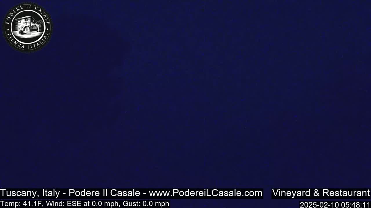 A dark blue, nighttime image shows a solid, uniform color with no discernible objects or features.