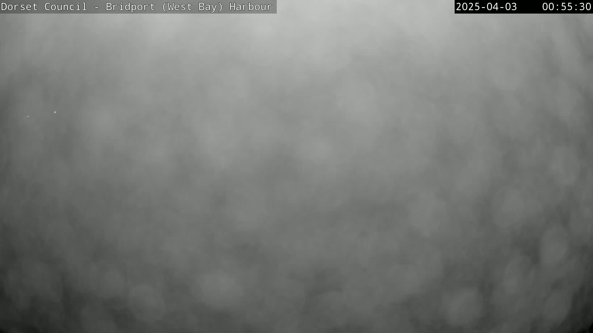 A very foggy or hazy scene is shown, obscuring any details.