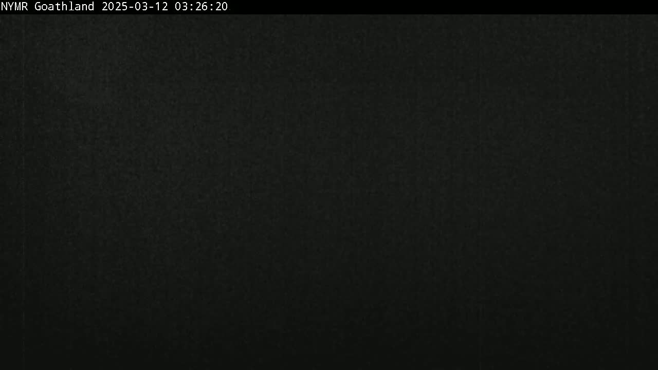 A dark, uniformly colored image shows a solid black field.