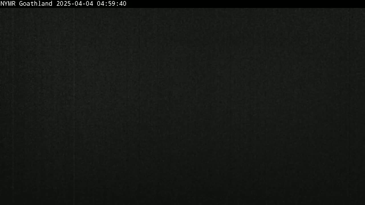 The image shows a completely dark, uniformly textured surface.