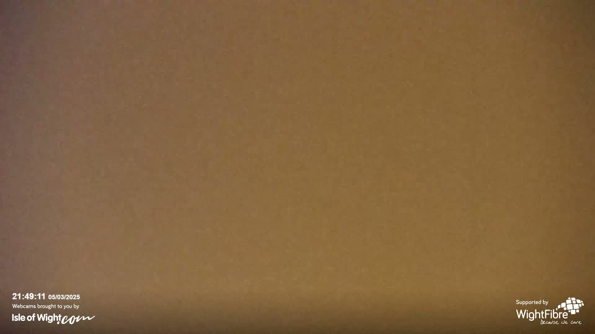 A uniformly brown, textured surface fills the entire image.