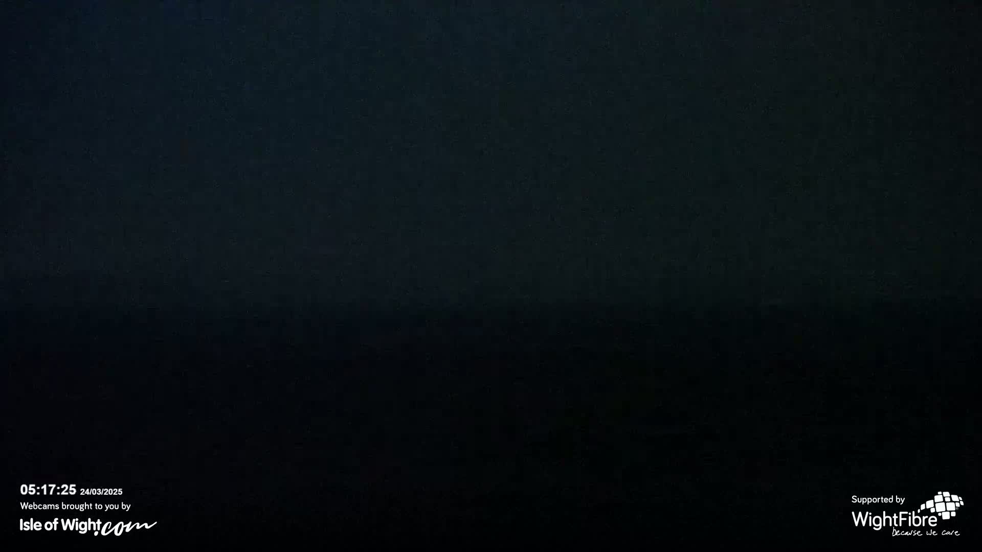 A dark, possibly nighttime, image shows a uniformly black scene.