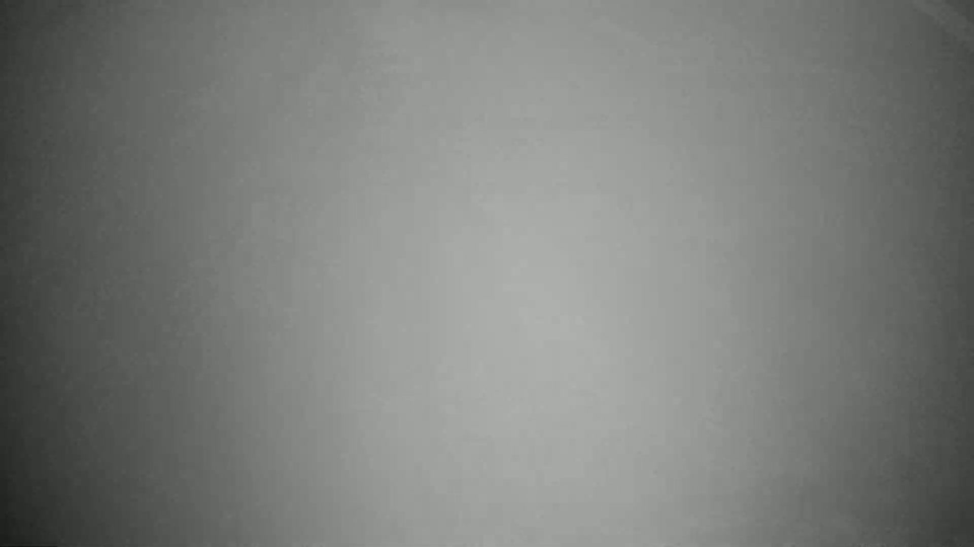 The image shows a uniformly gray surface with subtle variations in shading.