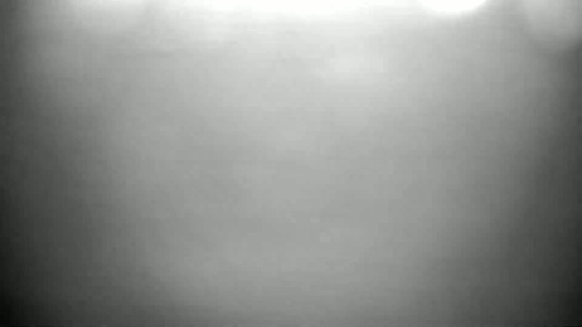A blurry, grayscale image shows a mostly featureless expanse of fog or mist.