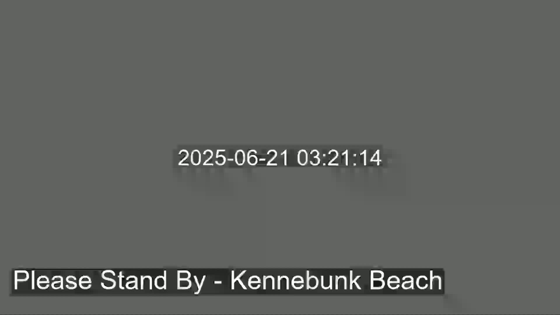 A gray screen displays a timestamp.
