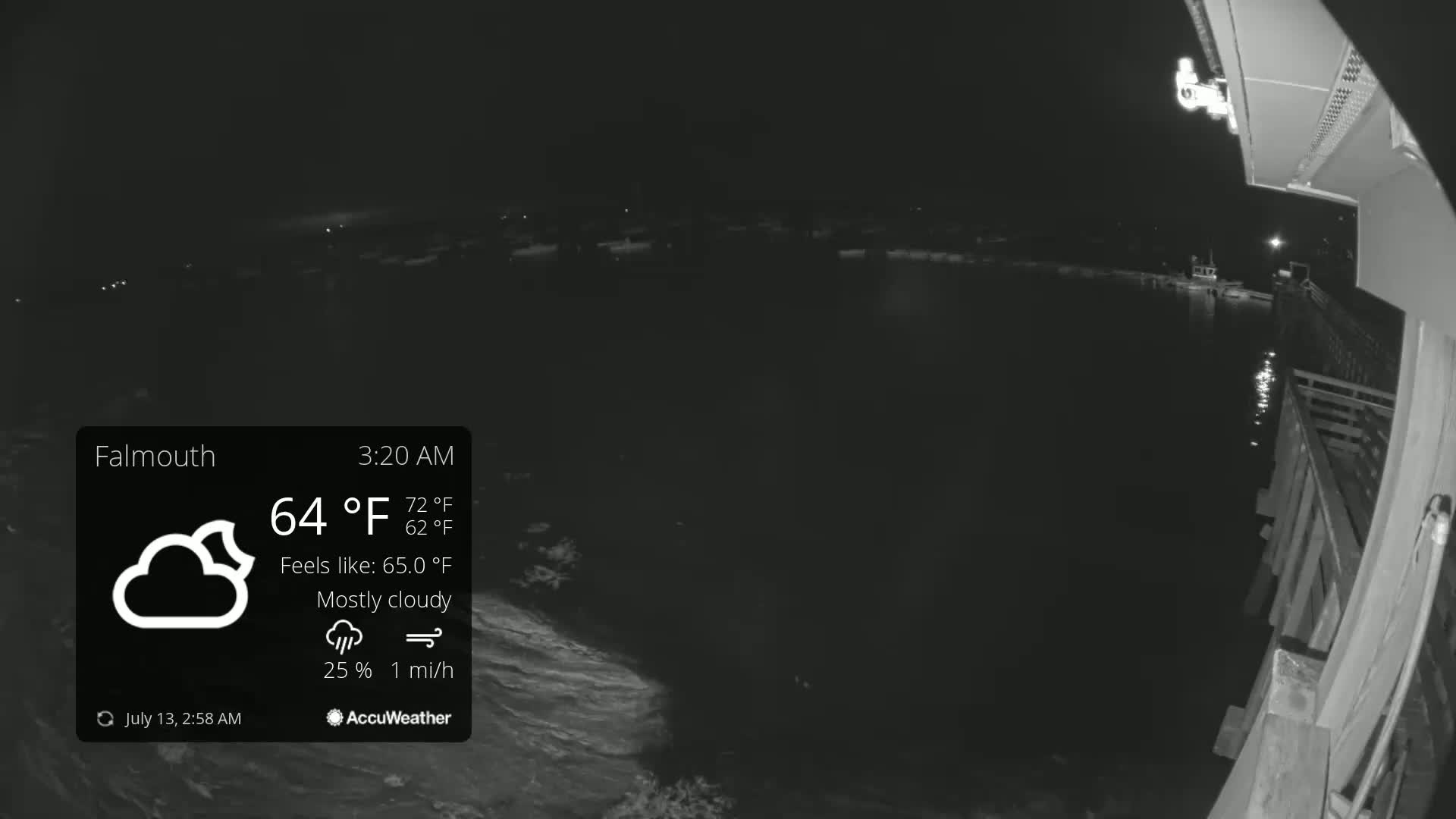 A nighttime, mostly cloudy view from a pier shows dark water with a slight chop and a boat in the distance under a 64°F sky.