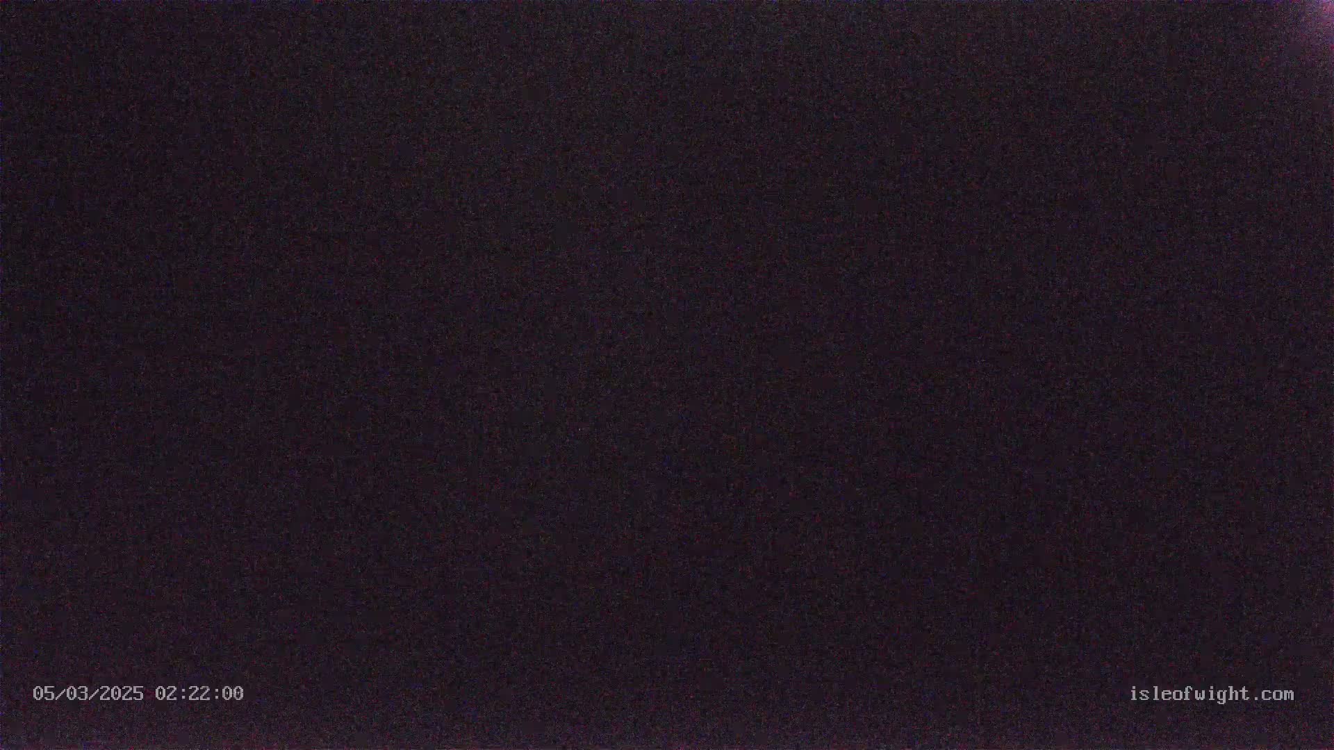 A completely dark image is shown, likely taken at night under very dark conditions.