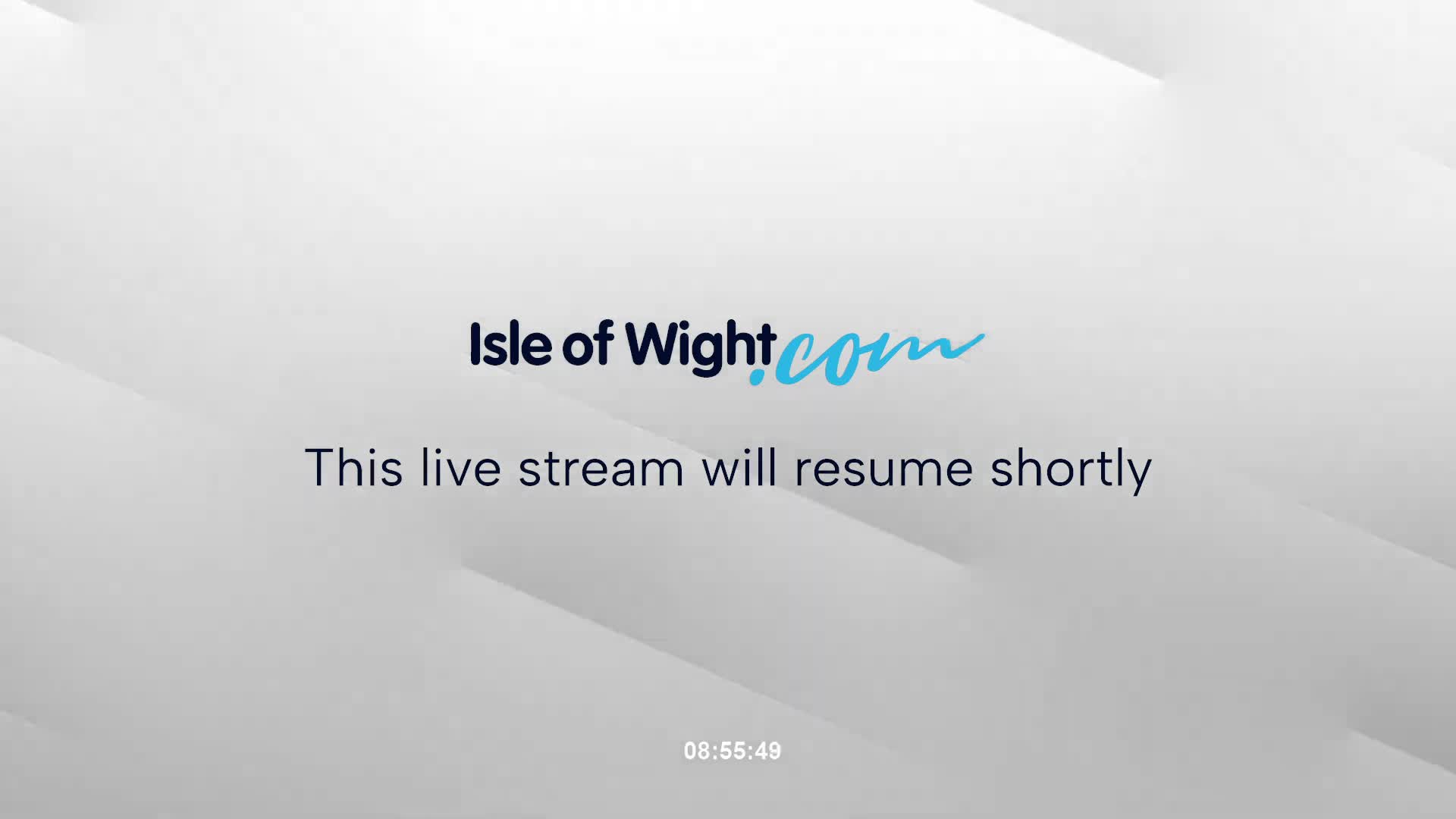 The image displays a light gray background with subtle abstract diagonal patterns.