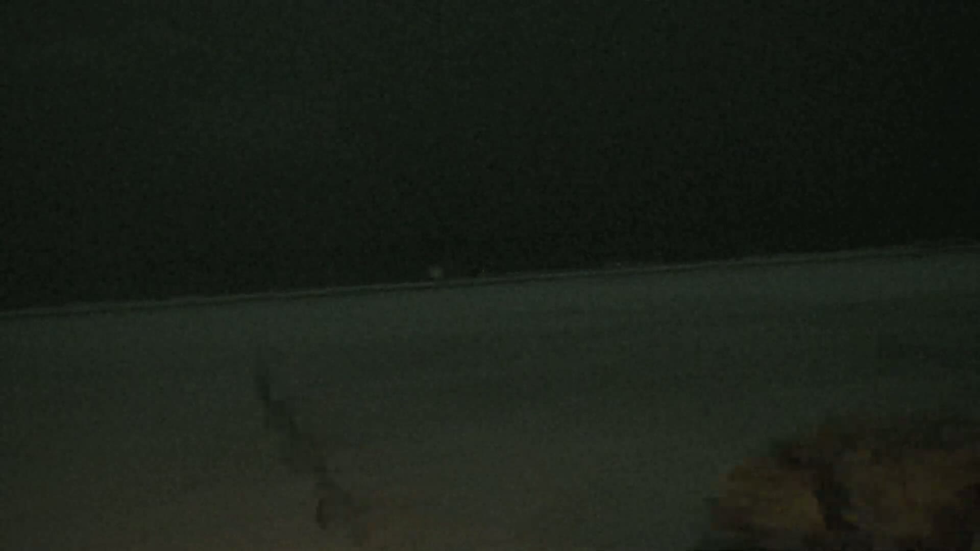 A dark, blurry image shows a flat, dark surface with indistinct shapes near the bottom.
