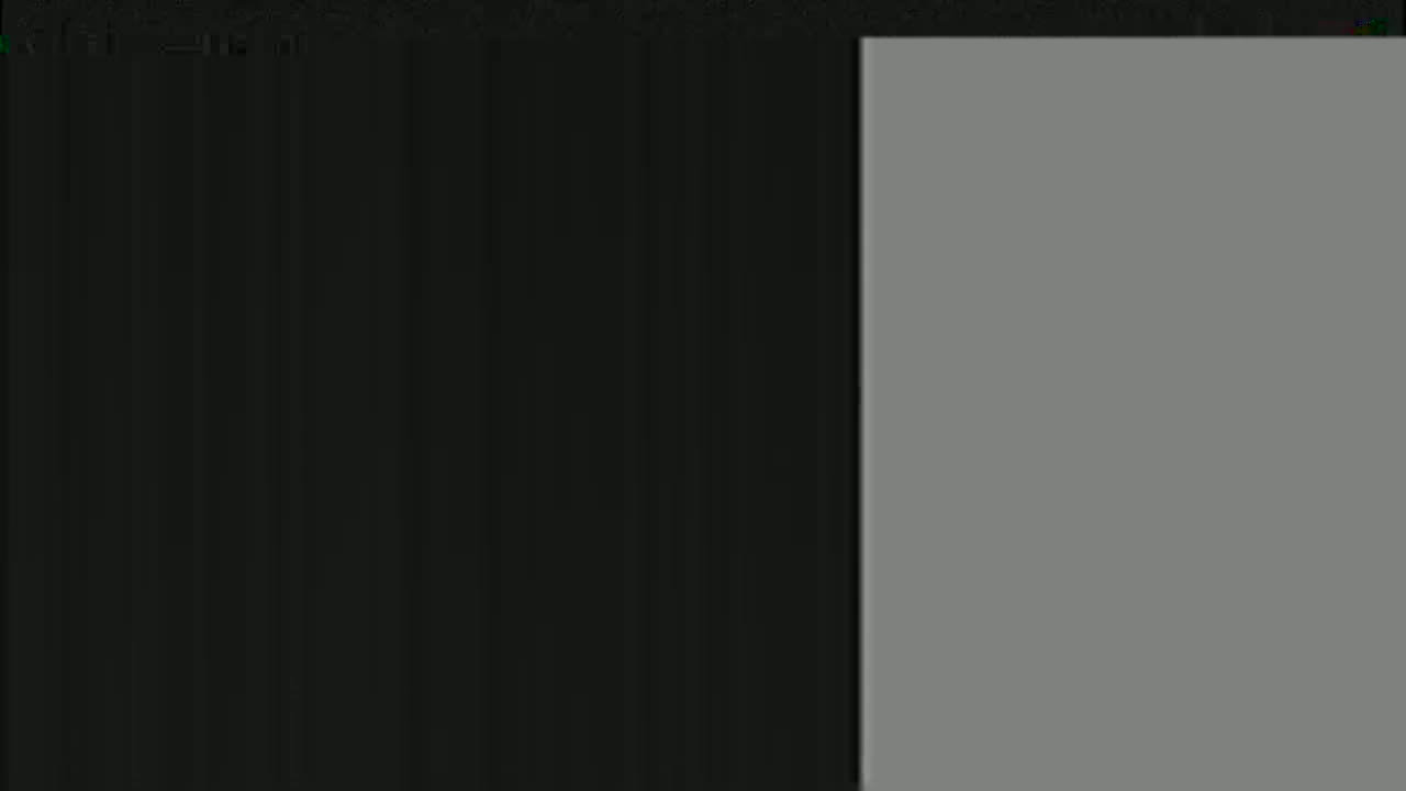 The image shows a vertically-oriented split screen with a dark gray or black section on the left and a lighter gray section on the right.