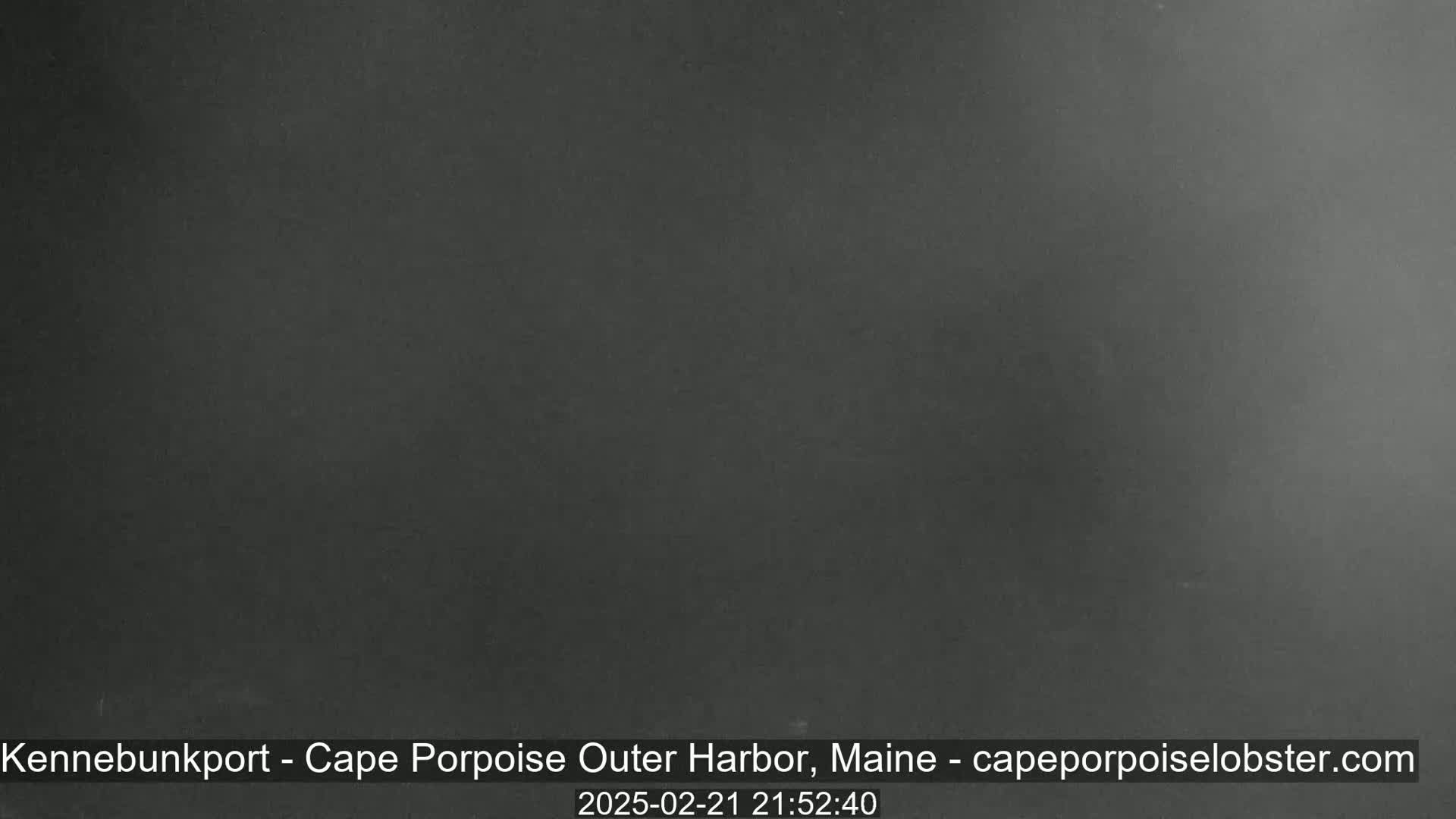 A dark gray, overcast night scene is shown.
