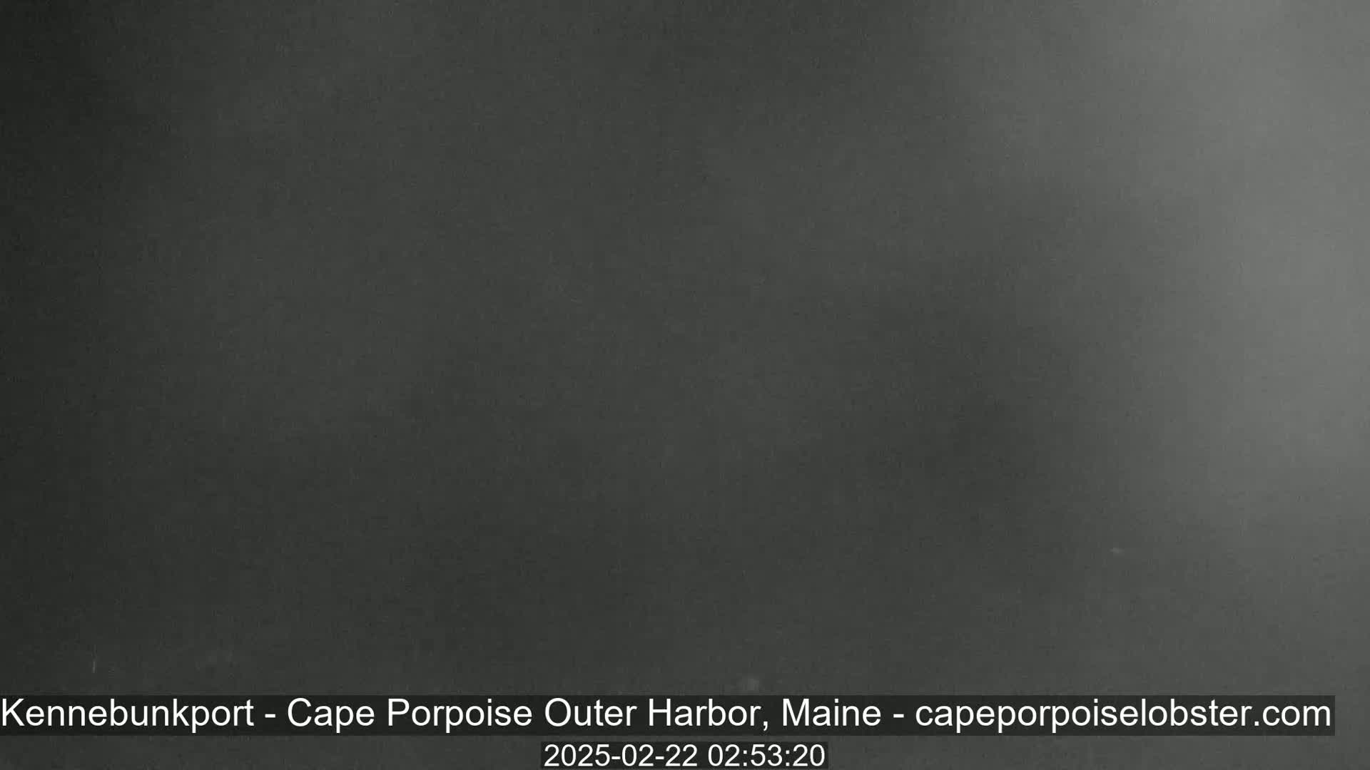 A dark, blurry image shows a nighttime, overcast sky.