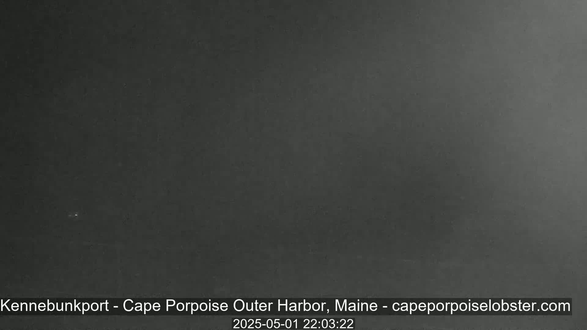 A dark, overcast nighttime scene is visible.