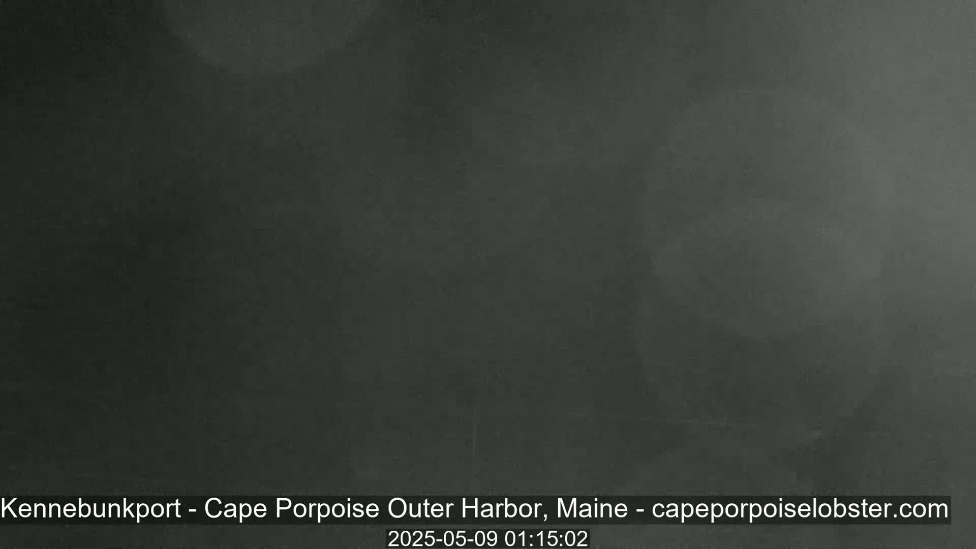 A dark gray, possibly nighttime, image shows a solid, featureless expanse.