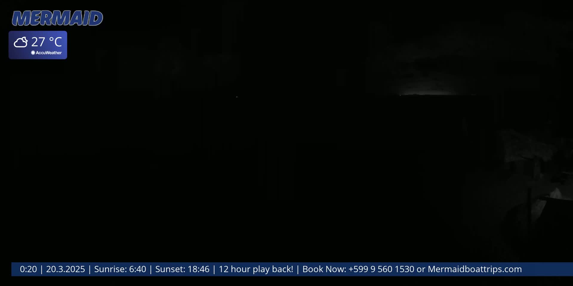A dark, nighttime scene shows a dimly lit area with a faint, bright horizon line in the distance, under cloudy skies with a temperature of 27°C.