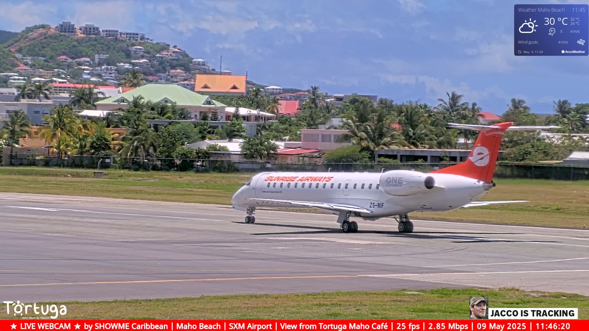 A Sunrise Airways plane taxis on an airport tarmac under a partly cloudy sky.
