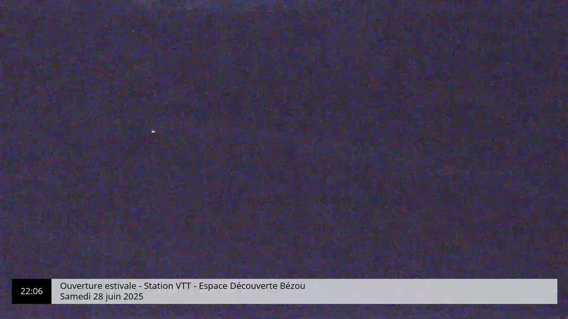 A dark, nighttime sky shows a single, faint star.