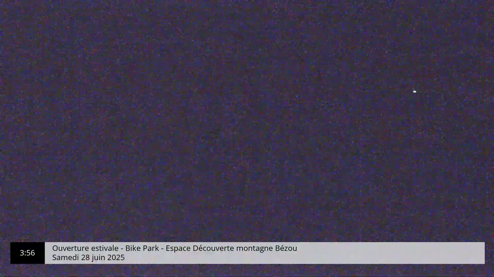 A dark, grainy image shows a single, faint light in the night sky.