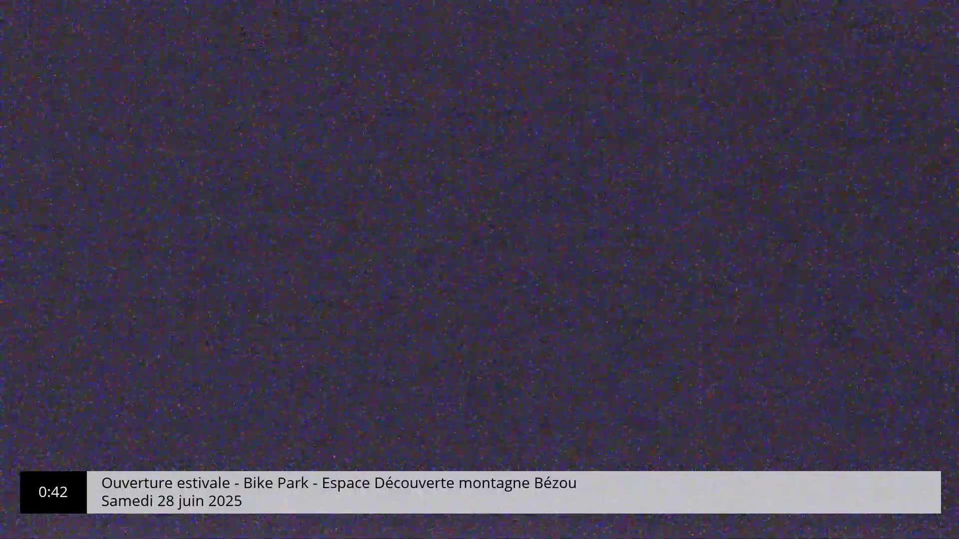 A dark purple, noisy image fills the frame.