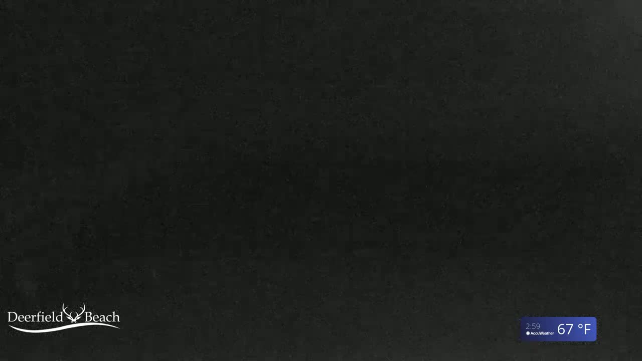 A dark-colored, textured surface is shown, with a temperature of 67°F displayed in the bottom right corner.