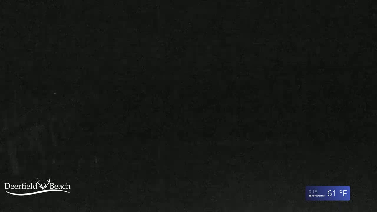 The image shows a completely dark, solid black surface at 61°F.