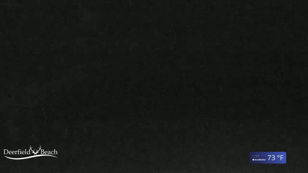 A dark-colored, textured surface is shown, with a temperature of 73 degrees Fahrenheit displayed in the bottom right corner.