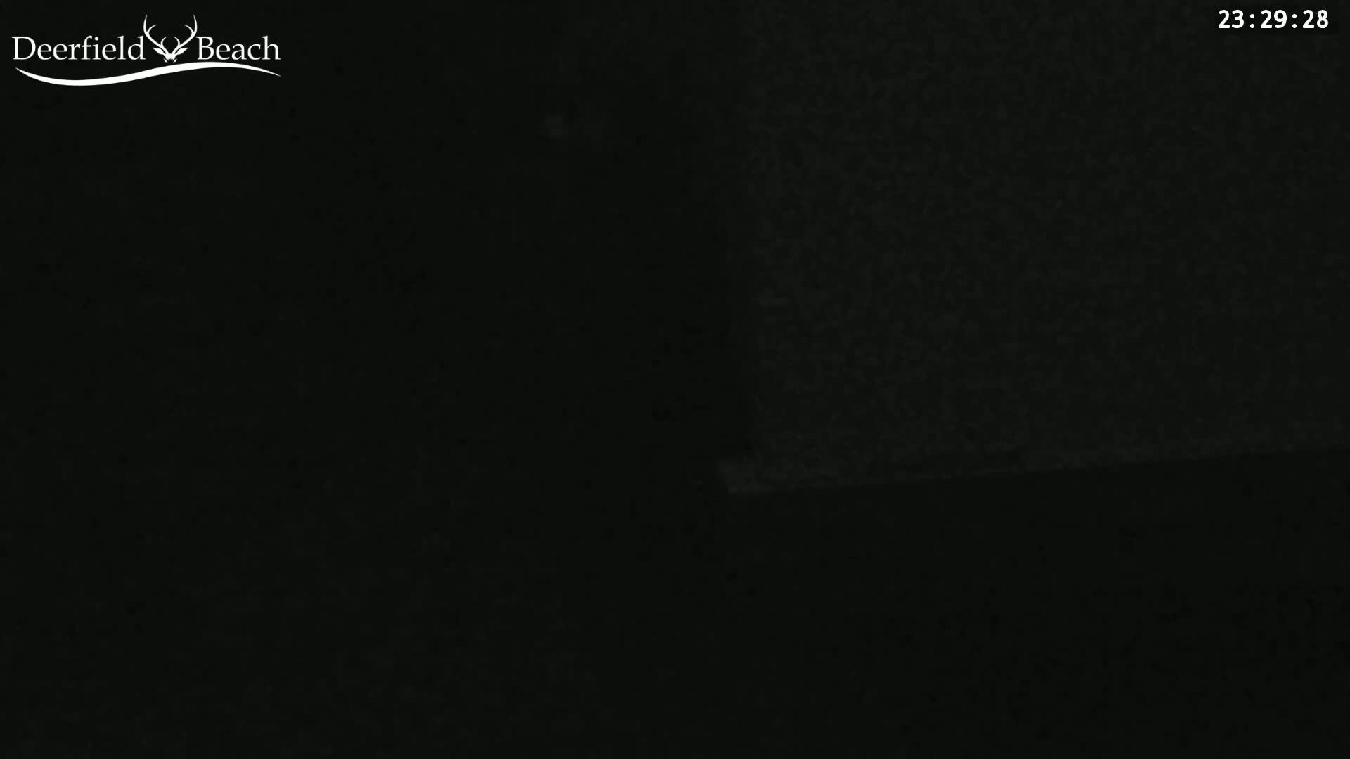 The image shows a completely dark scene at night.