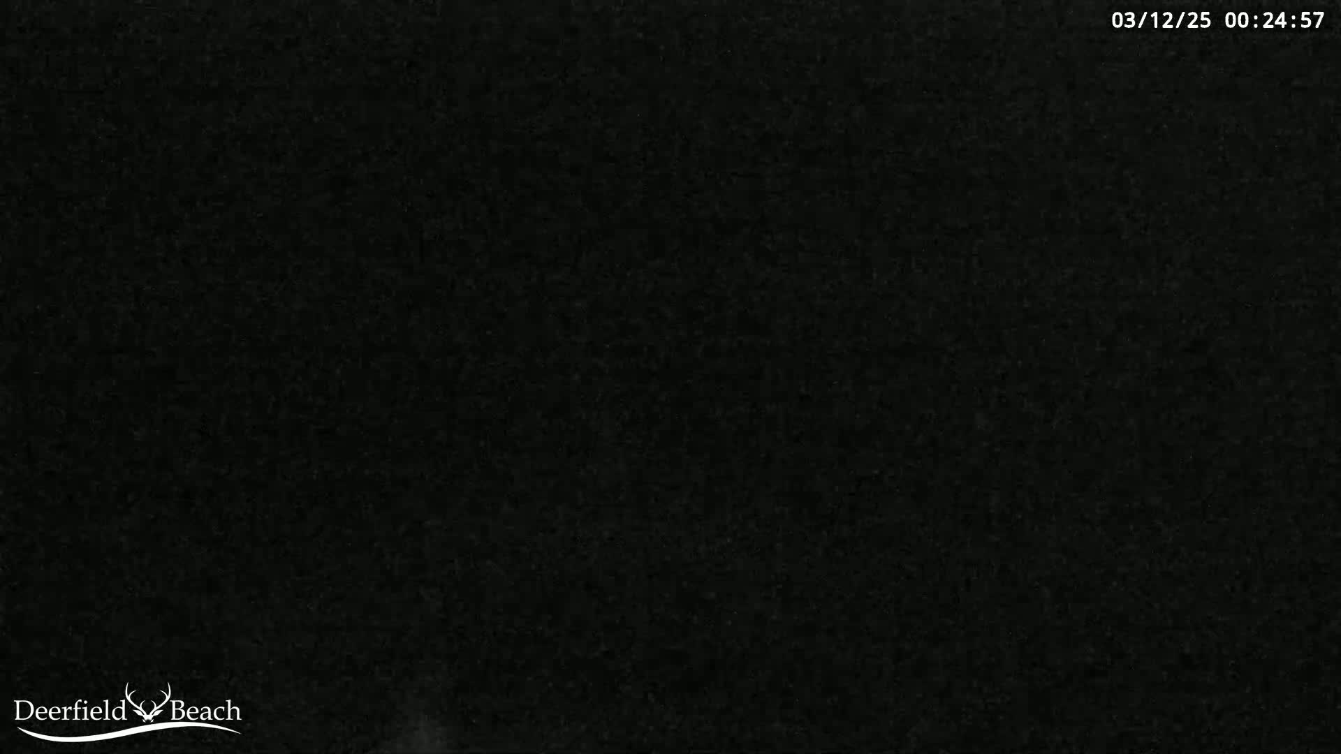 A completely dark image, possibly taken at night.