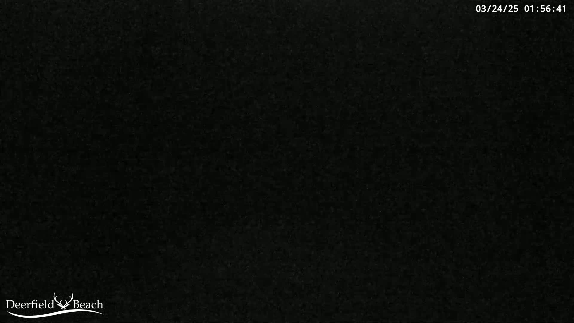 A completely dark image, possibly nighttime.