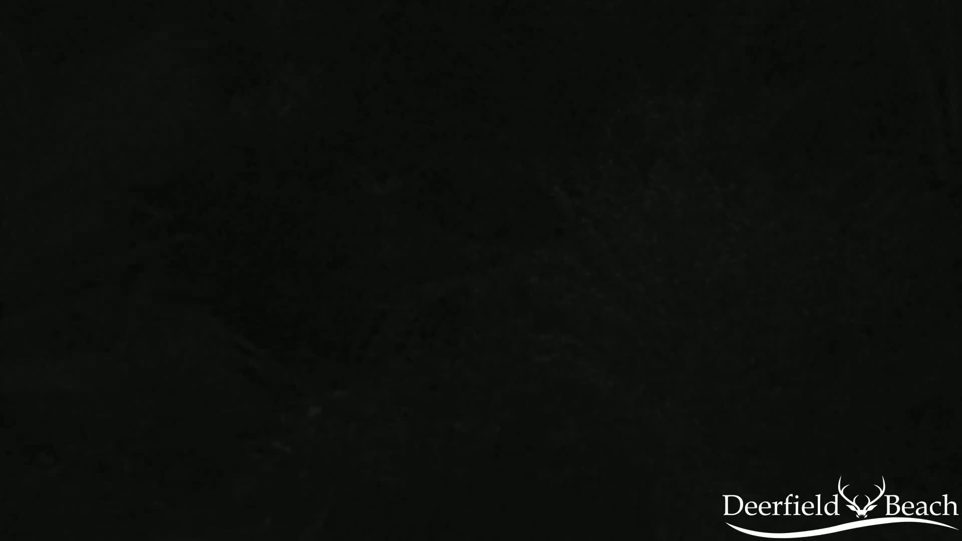 The image shows a solid black background with subtle variations in shade.
