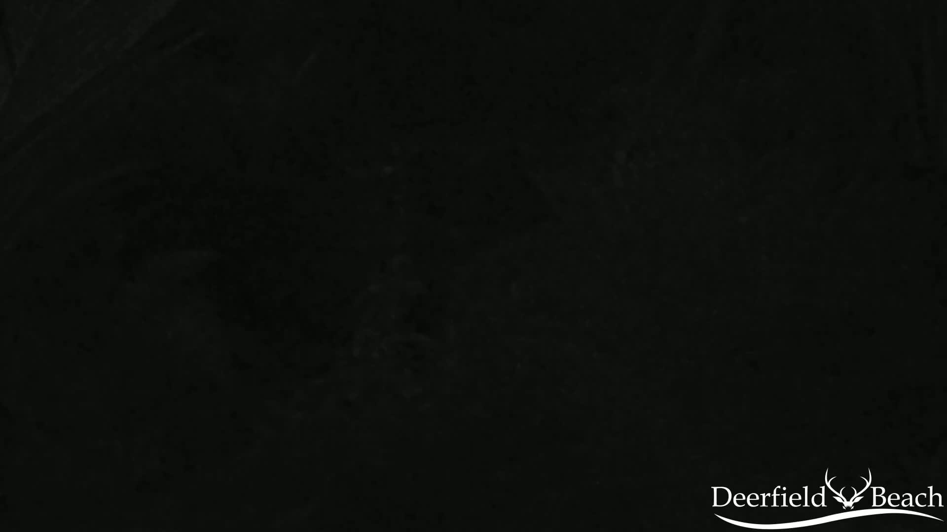 A completely dark, textured image.