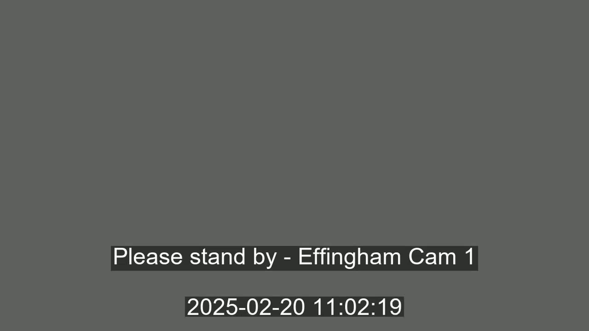 A solid, dark gray screen is displayed.