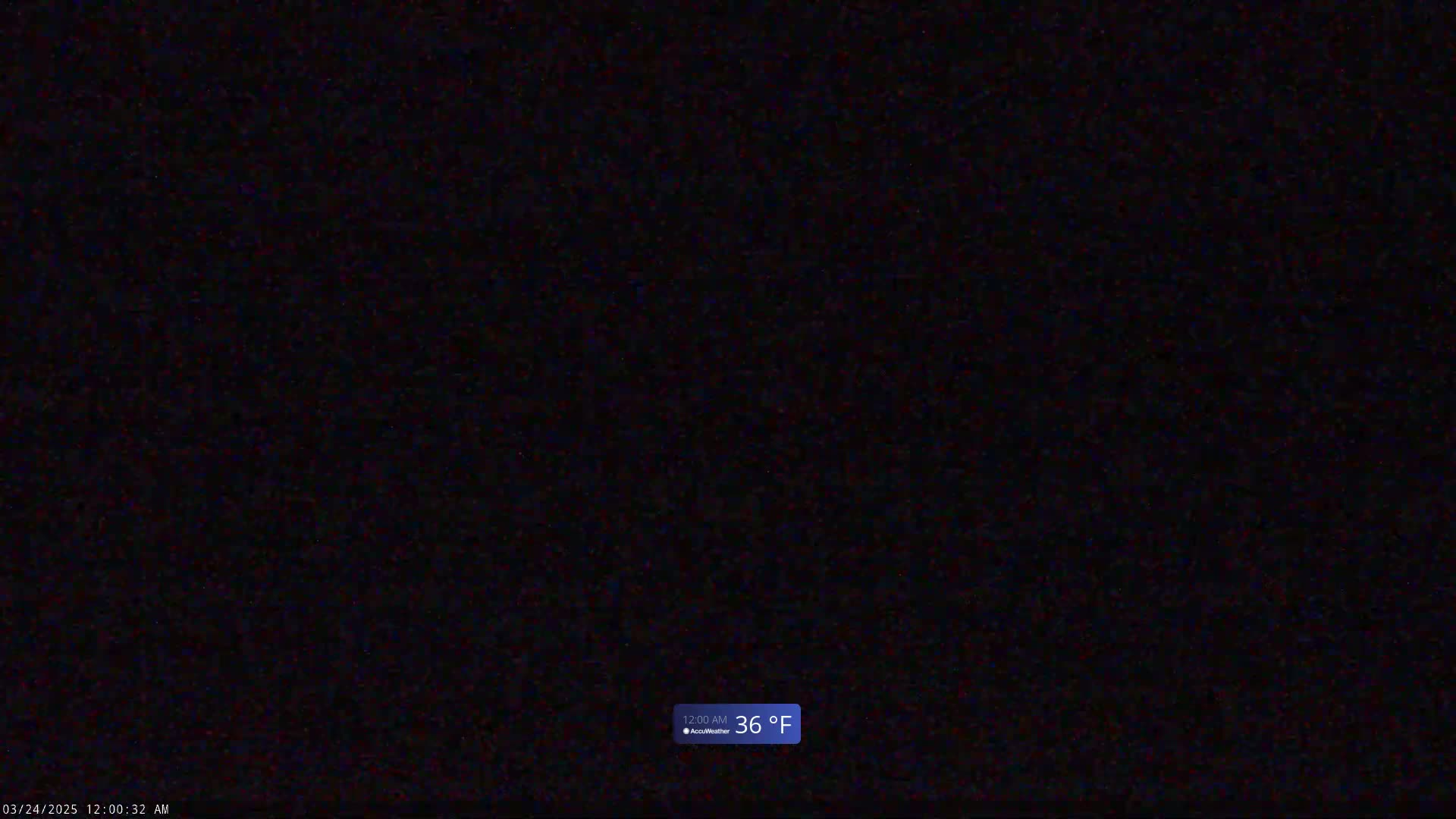 The image shows a completely dark, nighttime scene at 36 degrees Fahrenheit.