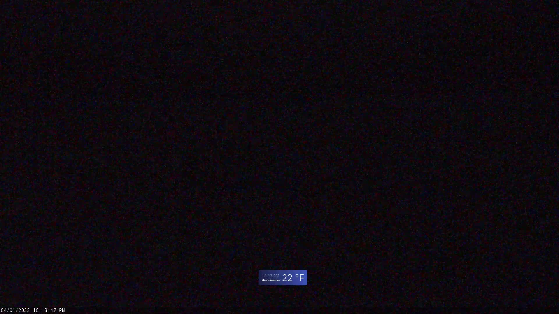 The image shows a completely dark, nighttime scene with a temperature reading of 22 degrees Fahrenheit.