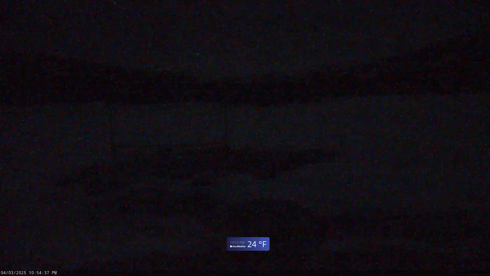 A dark, nighttime scene with a temperature of 24 degrees Fahrenheit.